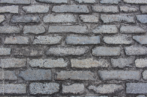 Wallpaper Mural Texture of cobblestone. Pattern of sidewalk tiles in the street. Cobblestones close up background. Torontodigital.ca