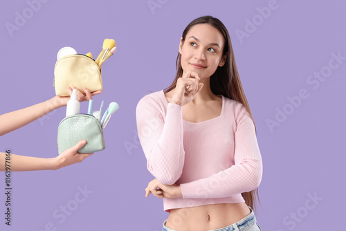 Thoughtful young woman and ...