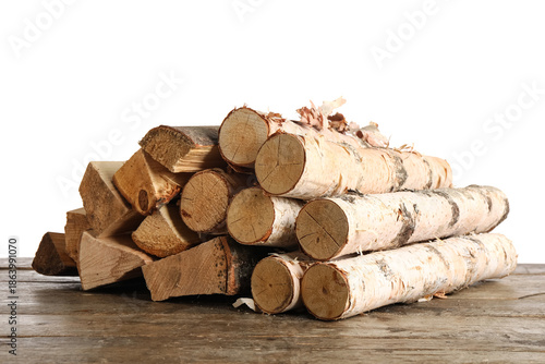 Stack of firewood on wooden...