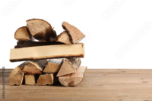 Stack of firewood logs on w...