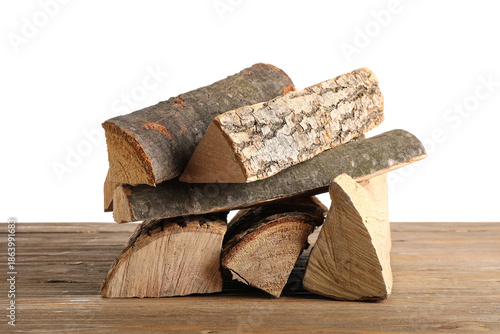 Stack of firewood logs on w...
