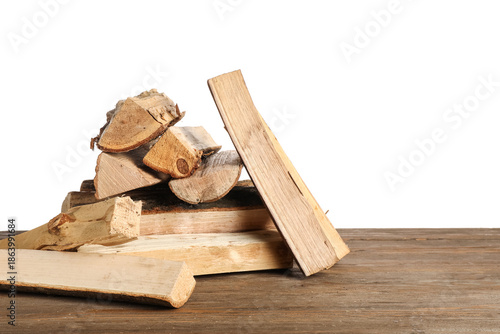 Stack of firewood logs on w...