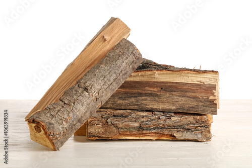 Stack of firewood logs on w...