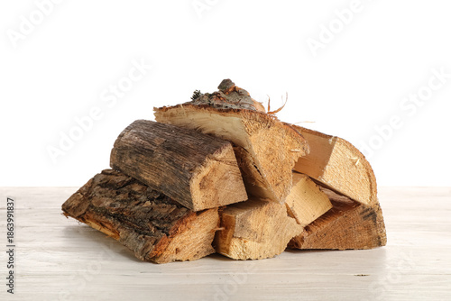 Stack of firewood logs on w...