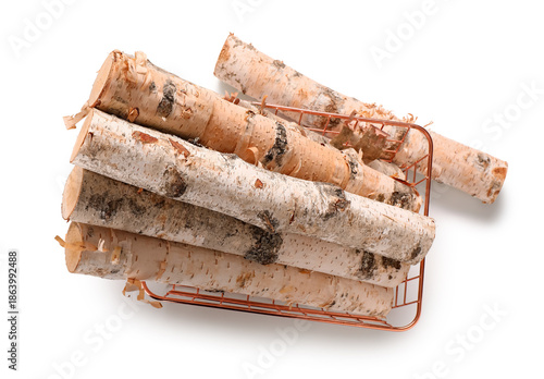 Metal basket with birch log...