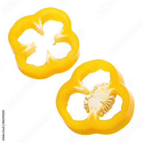 Two slices of fresh yellow bell pepper isolated on a for cooking