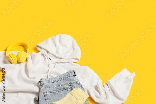 White hoodie with jeans and...
