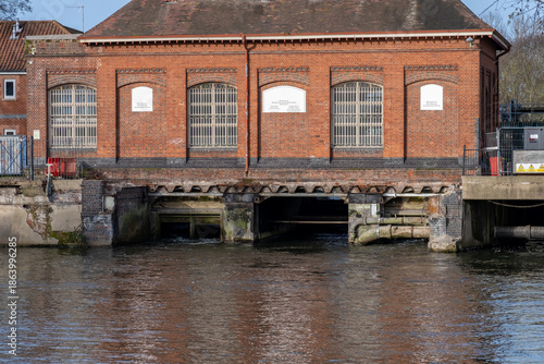 The Victorian era New Mills Sluice on the River Wensum in the city of Norwich