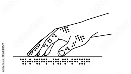 Hand reading braille text in tactile literacy