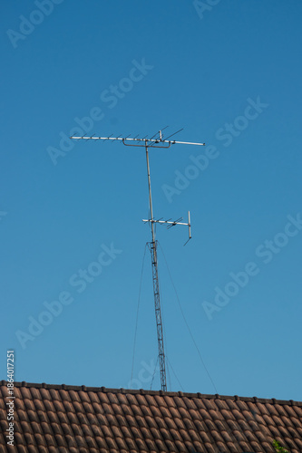 TV antenna on roof of house
