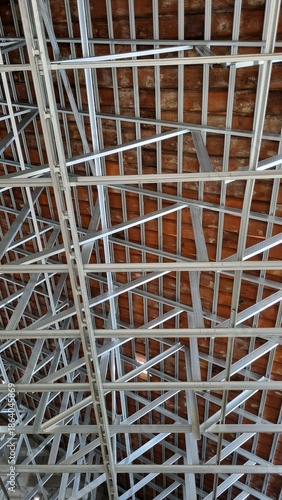 Metal Frame Structure of a Roof Under Construction.