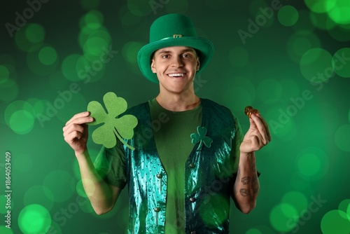 Young man with clover and c...