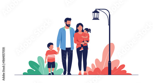 Happy family of four consisting of parents and two children walking together during a peaceful evening stroll in a park with leaves.