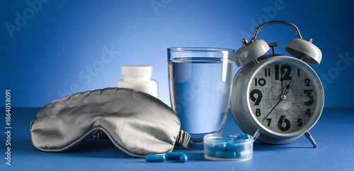 Melatonin pills with glass ...