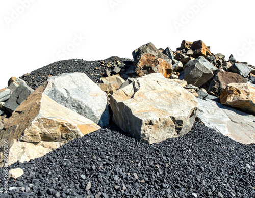 A pile of assorted large and small rocks scattered against a contrasting dark gravel base