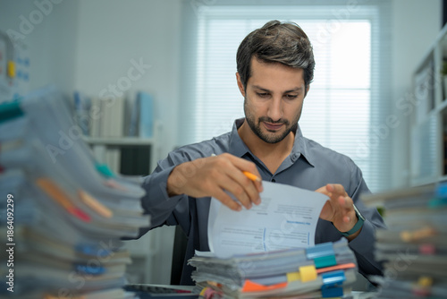 Quadro su tela Tired manager grappling with mental fatigue and anxiety, trying to maintain efficiency while handling an overwhelming stack of paperwork and reports