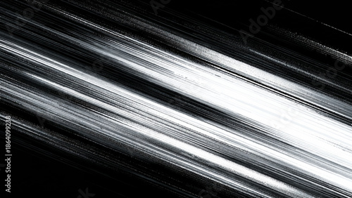 abstract diagonal streaks of light on dark background