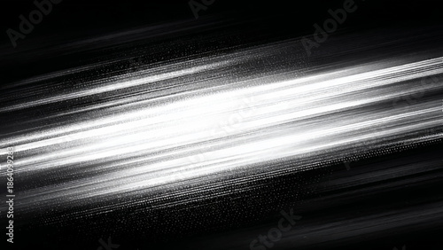 Abstract white light streaks on black background