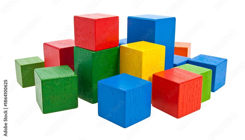 Obraz premium Assorted colorful wooden blocks, scattered and stacked, arranged against a bright white background. A playful arrangement of building toys