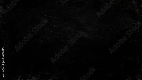 scratched dark surface with scratches and marks