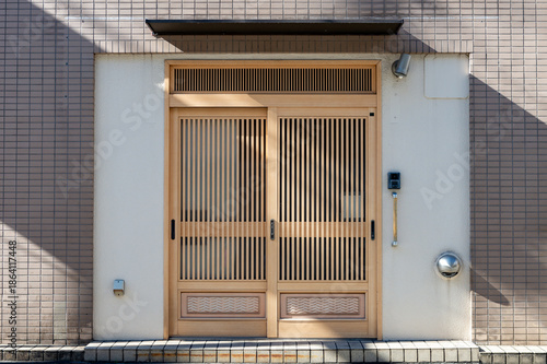 sidewalk by street wall  and  door