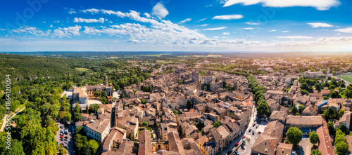 Tableau sur toile Overlooking Uzes in Gard, France, this scene captures the charming stone buildings and rooftops of the city