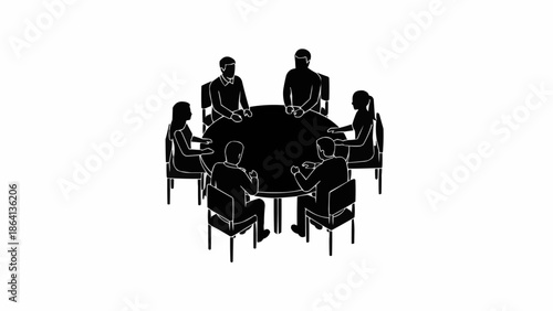Group of people sitting around a round table in a meeting.