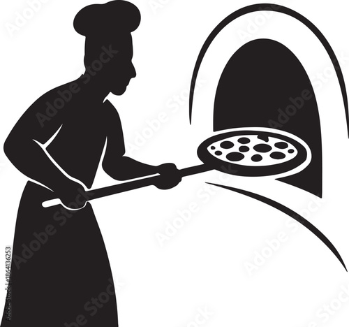 Chef placing pizza in oven