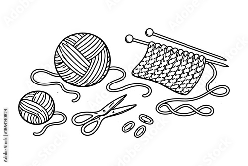 Handcrafted knitting scene with yarn balls, needles, and accessories in black and white