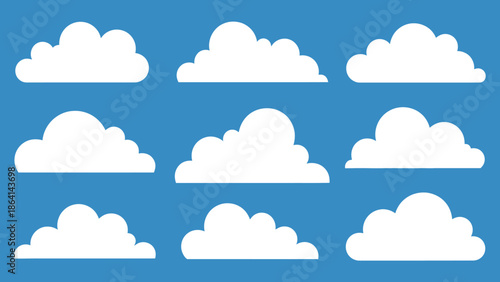 Collection of white fluffy clouds in flat design style on a bright blue sky background