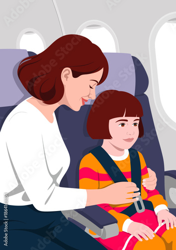 This touching image captures a loving moment of a mother fastening her child's seatbelt on an airplane, highlighting the special bond and joy of traveling together.