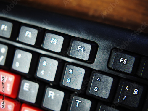 key board foe computer and butom active in black and red color