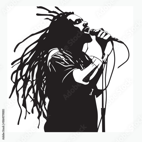 silhouette of dreadlocked reggae singer.