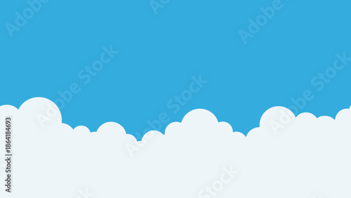 Clear blue sky background with fluffy white clouds at the bottom, offering a serene view.