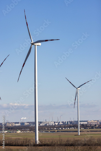 Photography Windräder auf Feldern und im Hintergrund die slowakische Hauptstadt Bratislava