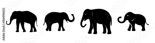 Four silhouetted elephants