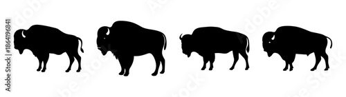 Silhouettes of four bison
