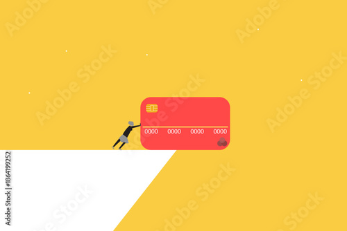 Financial struggle and the heavy burden of debt management in today's economy. Business woman pushing a giant red credit card toward a cliff, symbolizing the effort to overcome financial liabilities 