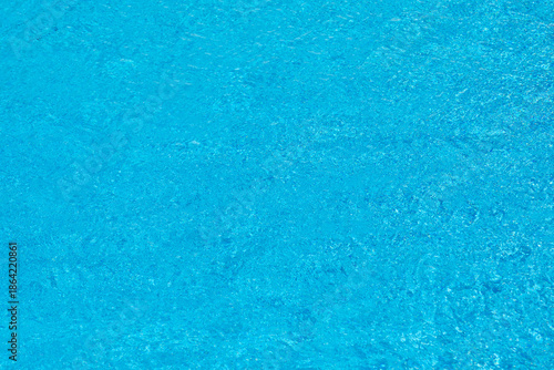 Obraz na plátně background of reflecting water inof a pool with blue tiles