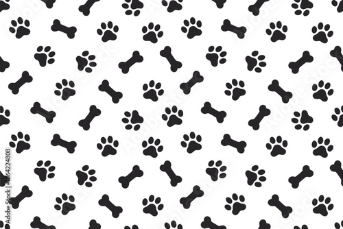 A playful pattern of black paw prints and dog bones on a white background