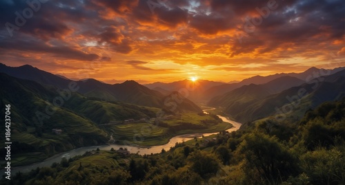 breathtaking mountain valley landscape with winding river at vibrant golden sunset in rural asia.