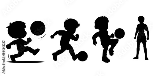 silhouette of a boy playing football