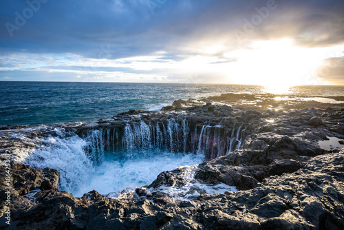 Wallpaper Mural Sunrise Bufadero water blasting into the air on the coast of Gran Canaria in the Canary Islands Torontodigital.ca