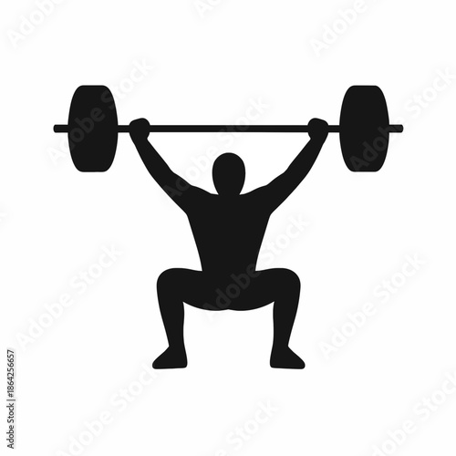 Man Lifting Weights Overhead In Squat Position