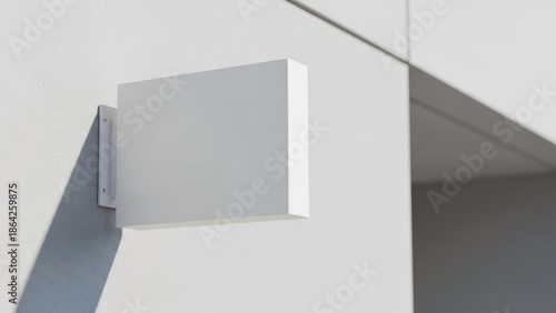 Blank white signage on a building exterior, perfect for branding and advertising mockups