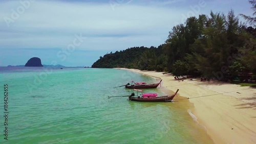 Aerial view of Thai boats moored at the tropical beach of Ko Ngai island in Thailand