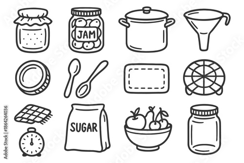 Home canning essentials: jars, utensils, and fresh ingredients.