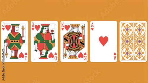 four playing cards on orange background