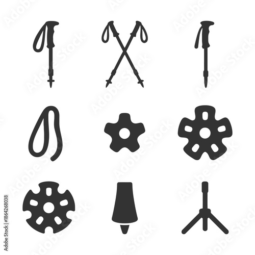 Collection of trekking pole components and accessories on white background.