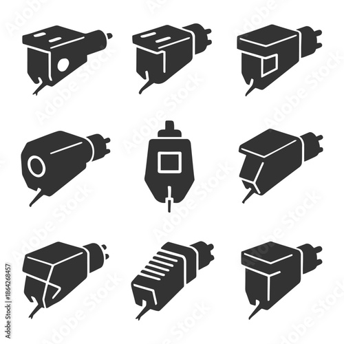 Set of various electrical plug adapters for international use.